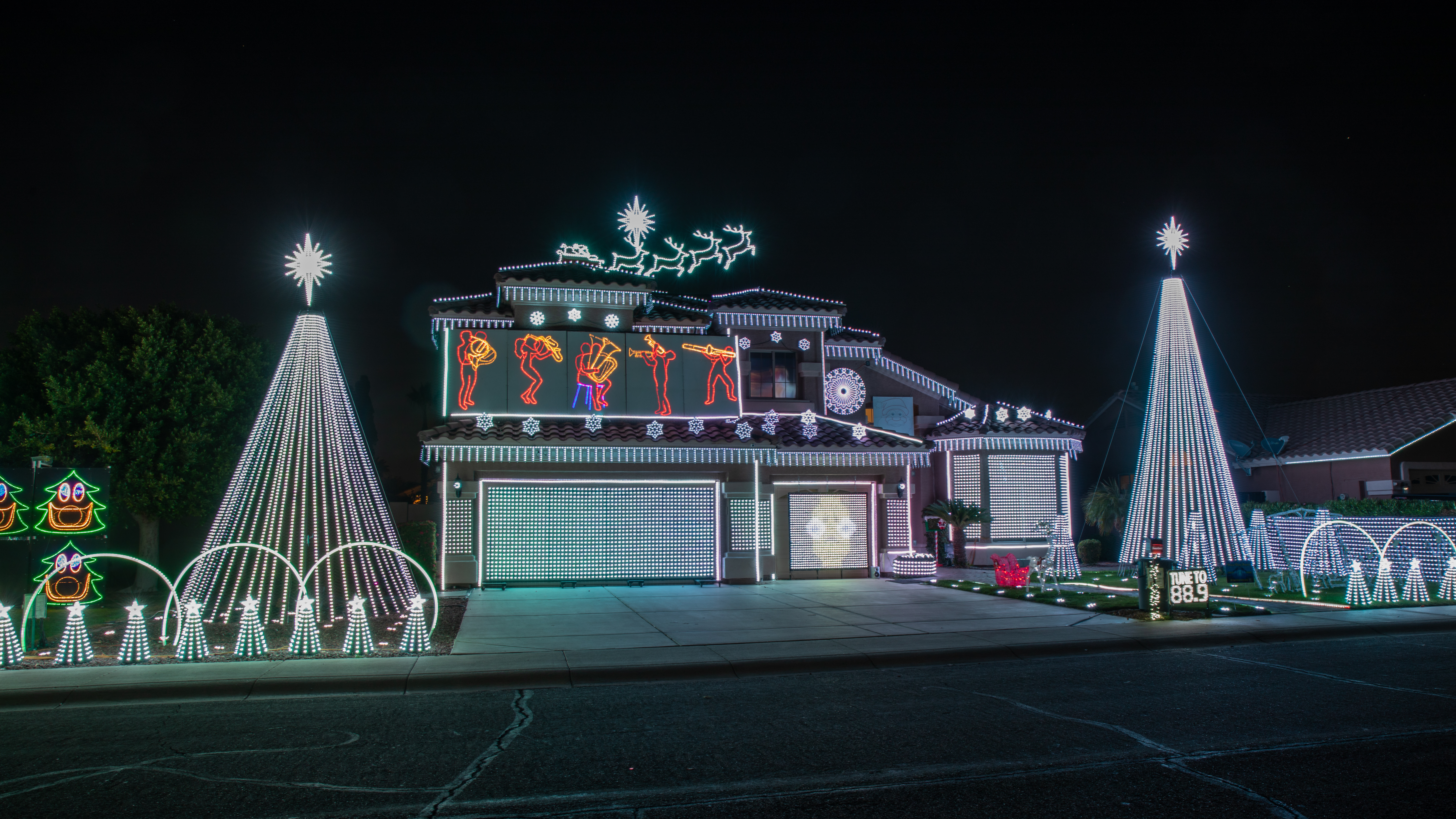 House covered with holiday lighting (Photo taken by Kyle Ellsworth/Ewing Outdoor Supply) 